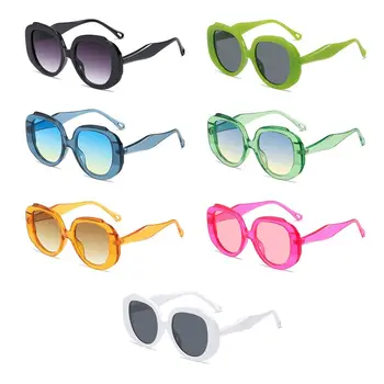 Модни очила Ярко-розови дамски слънчеви очила в кръгла рамка Слънчеви очила